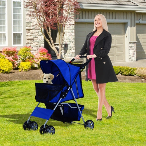 PawHut 4 Wheel Dog Pet Stroller in blue, featuring a folding design and sunshade, with a woman pushing it in a garden.