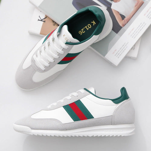 K01.26 Illilook Faux Leather Sneakers with white faux leather upper, green and red stripe accents, and gray suede toe cap.